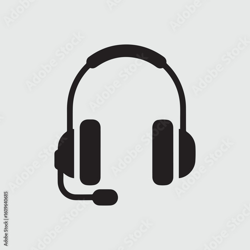 Black icon of headphones with a microphone on a light gray background