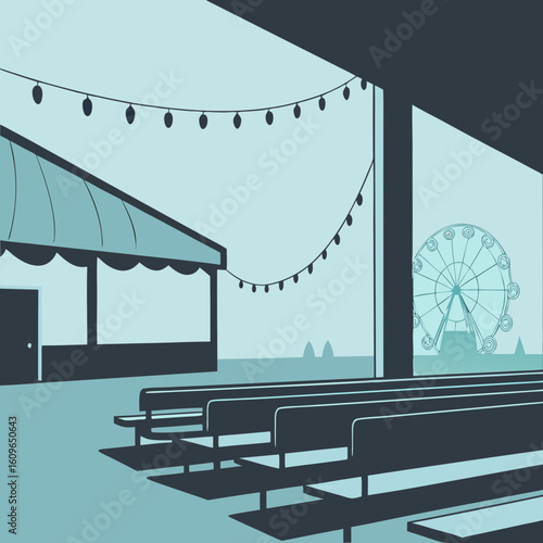 Empty carnival tent with benches and ferris wheel in background  