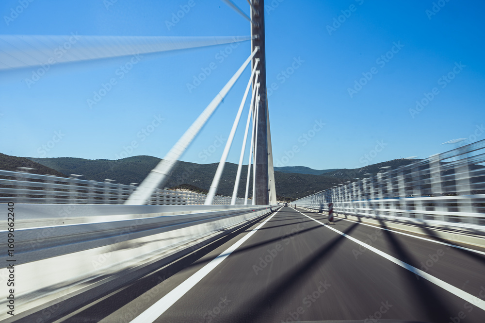 Obraz premium Speeding across Pelješac Bridge Croatia scenic cable stayed highway fast driving