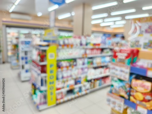 Wallpaper Mural Blurred view of a brightly lit convenience store interior Torontodigital.ca