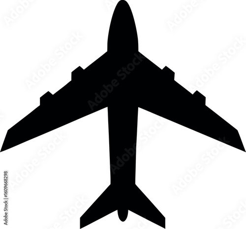 Black silhouette of a jet airplane viewed from above