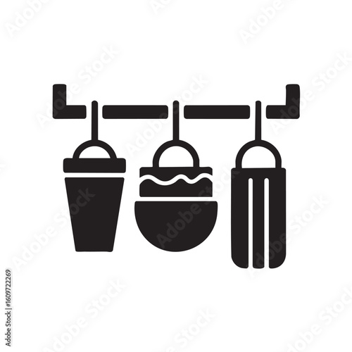Three black punching bags hanging from a rack boxing sports