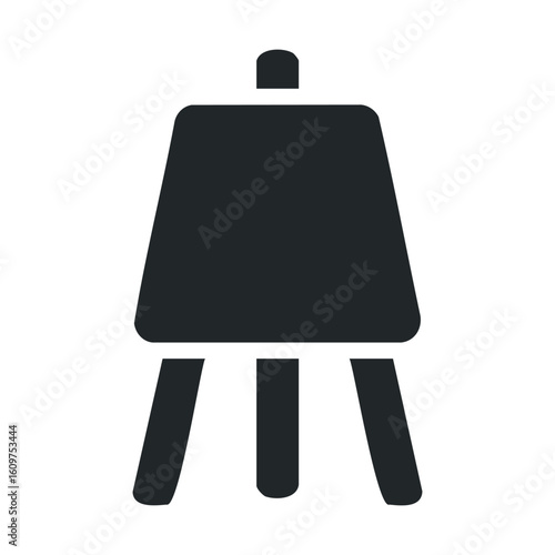 Simple black and white icon of an easel on white background