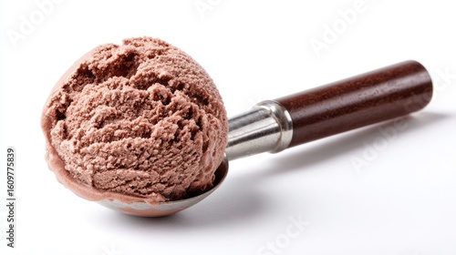 A scoop of chocolate ice cream on a metal spoon, isolated on a white background, delicious.