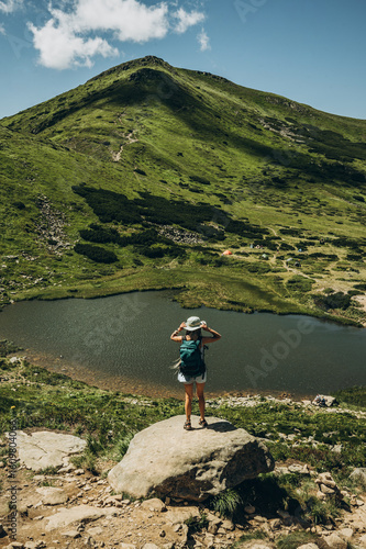 woman on a mountain lake