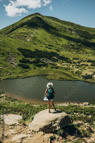 woman on a mountain lake