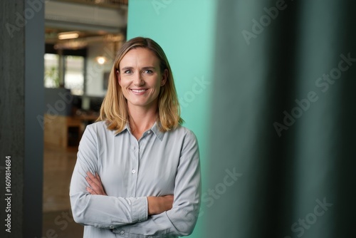 Portrait of confident businesswoman in office setting professional headshot photo