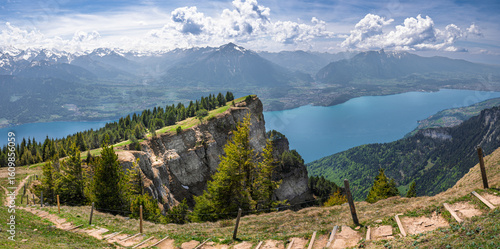 Panoramic view of Bernese Alps and Lake Thun in the Swiss canton of Bern from the summit of Niederhorn mountain
