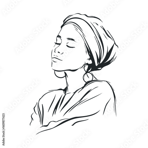 Woman in headscarf enjoying a peaceful moment