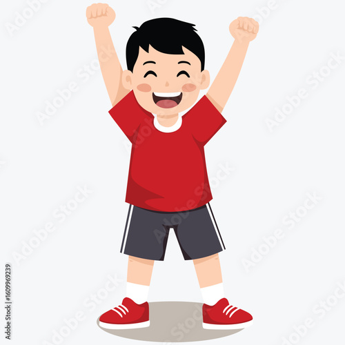 A young boy with black hair and a red shirt raises his arms in a gesture of joy and celebration.