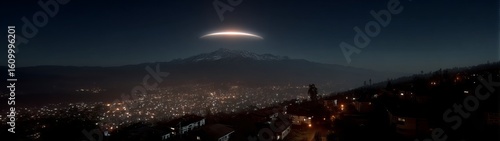 Ufo sighting over city lights nighttime panorama 360 degree hdr imagery urban landscape