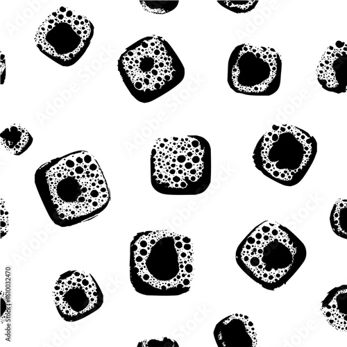 Black and white seamless pattern of abstract square shapes with bubble like texture in a scattered arrangement