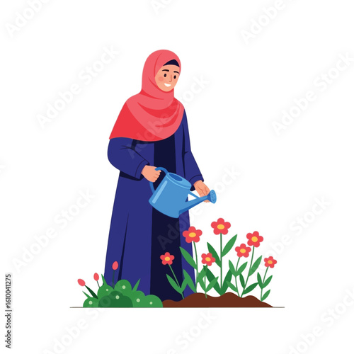 A woman wearing a hijab waters flowers in a garden, smiling happily.