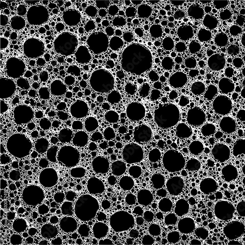Dense arrangement of black circles surrounded by a network of white lines and small circles art