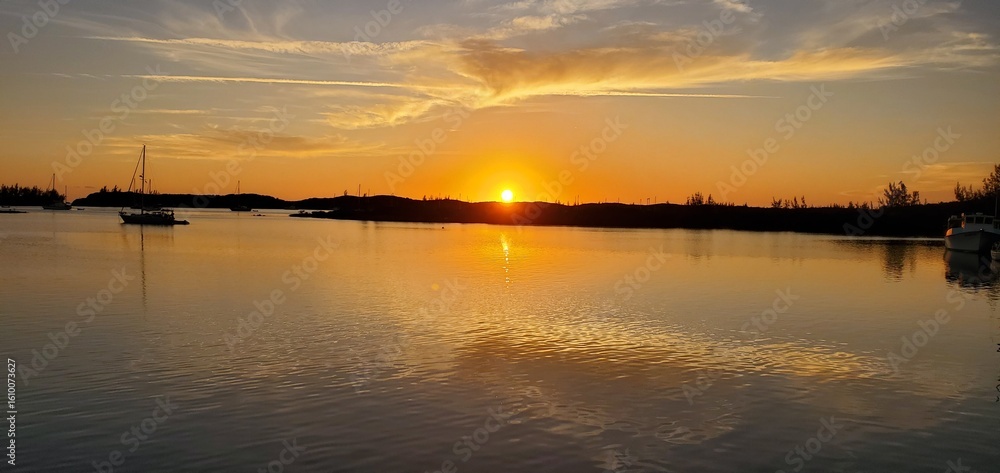 Obraz premium sunset over the river