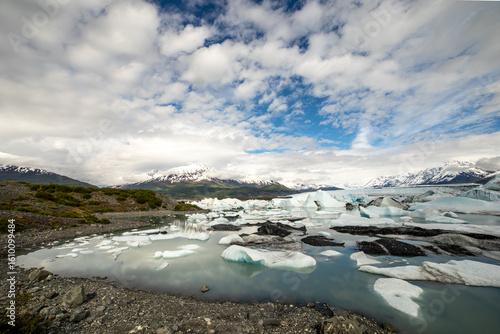 Glacier Lagoon with Icebergs and Snowy Peaks