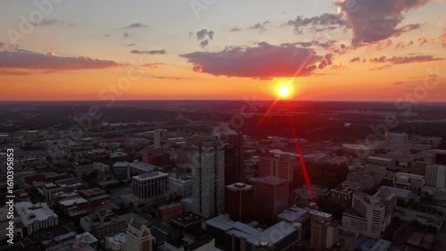 The sun sets over the cityscape of birmingham, alabama