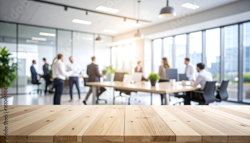 Light wood table in blurry modern office setting
