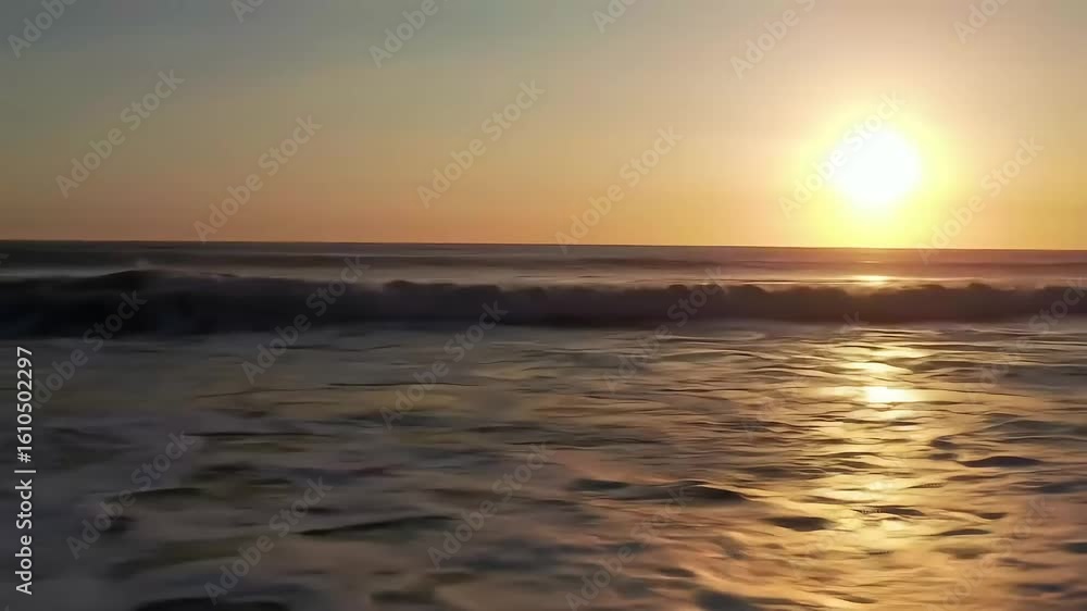 Ocean sunset waves beach; golden hour calm Ocean sunset waves beach; golden hour calm