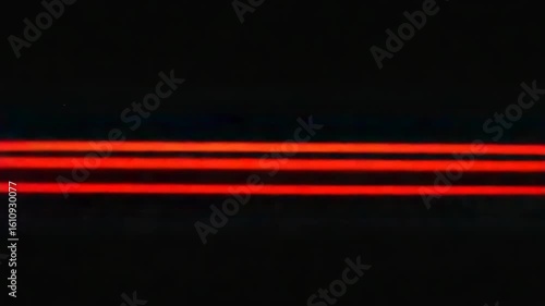 Vibrant streams of traffic light trails in night cityscape with endless motion