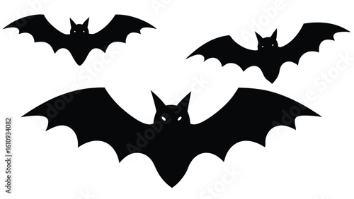 A spooky group of three black bat silhouettes with glowing white eyes, flying together against an isolated white background. A classic Halloween illustration.