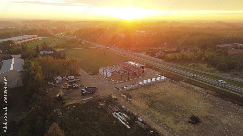 Fototapeta premium Industrial building under construction in countryside