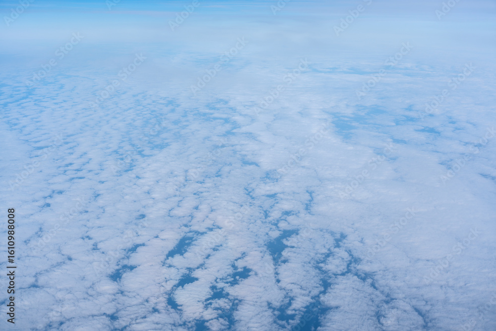 Obraz premium Blue sky with white clouds, flying above cloudy sky texture pattern, cloudscape blurred light