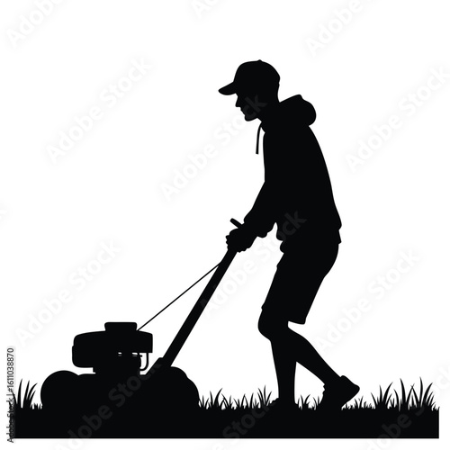 Silhouette of a person mowing a lawn grass