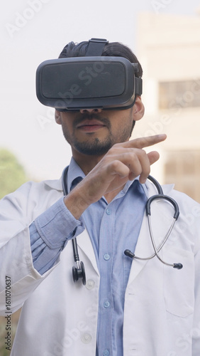 Photography Vertical Photo of Indian Doctor Working in VR Headset, Virtual Reality