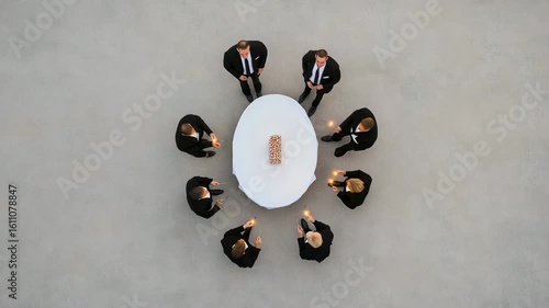Professional Meeting with Businesspeople in Formal Attire and Candles