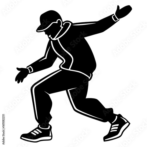 Silhouette of a breakdancer in action