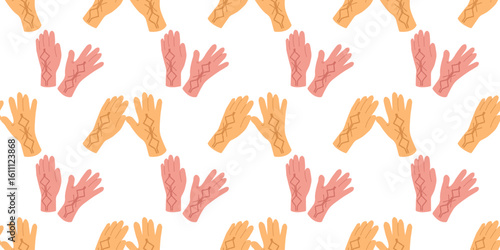 Seamless autumn pattern with cozy clothing items like gloves in flat style. Hand drawn vector illustration for banners, posters and social media