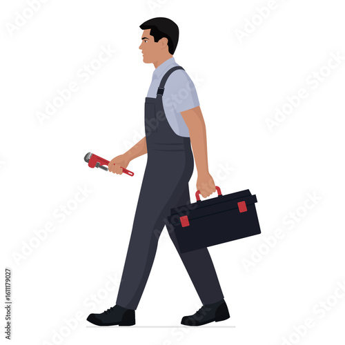 Professional plumber walking and holding tools