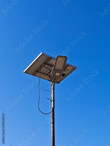 solar lights against blue sky