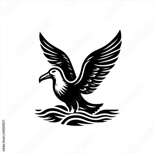 Seagull flying over waves