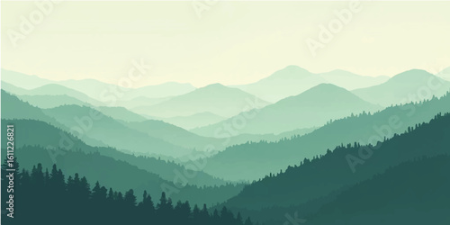 Sunrise over misty mountain peaks