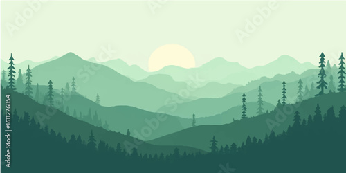 Panoramic misty mountain landscape with a fiery sunset over the valley and silhouettes of trees
