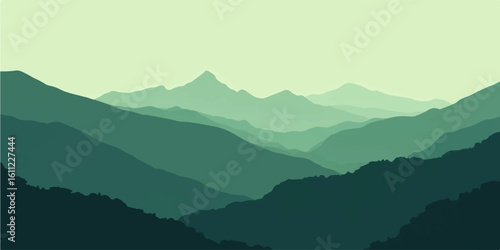 Morning mountain landscape with foggy peaks, misty hills, and forested valleys under a soft sky