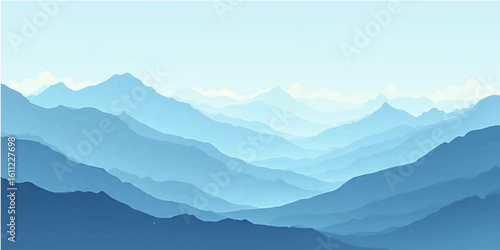 Sunrise over misty mountain peaks and