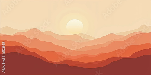 A beautiful orange sunrise paints the foggy mountain landscape with light