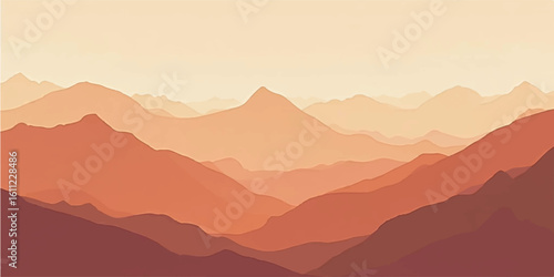 A beautiful mountain landscape at sunrise, with light mist and fog settled in the valley below the peaks