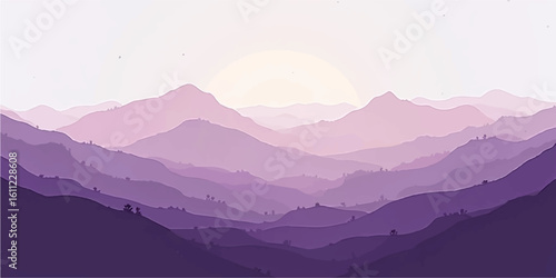 Sunrise paints a serene mountain landscape with a view of misty peaks and a valley shrouded in fog