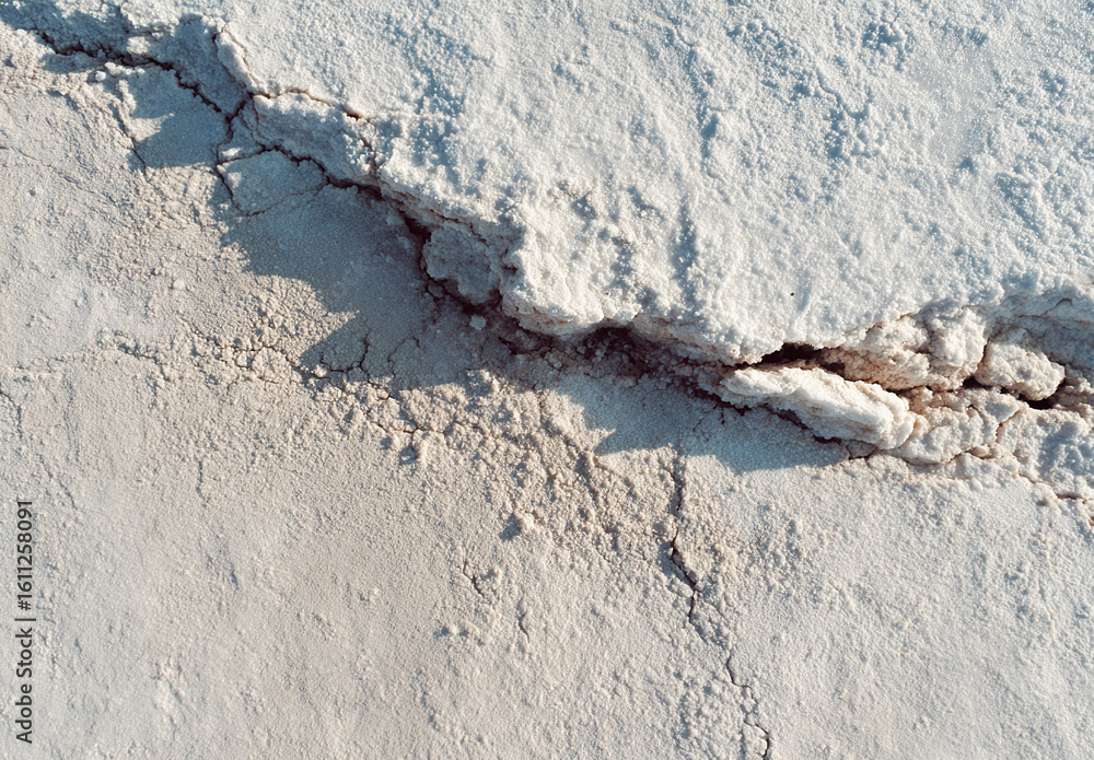 Fototapeta premium Aerial view of vast white salt flat landscape