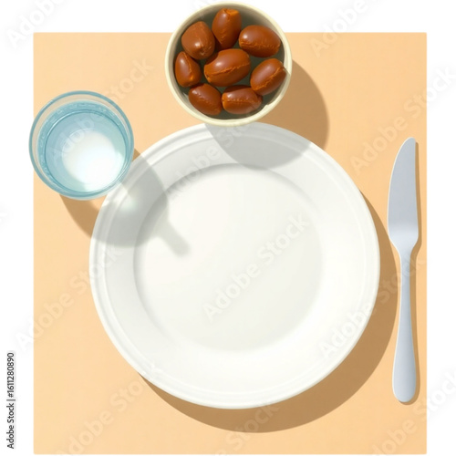 Iftar table setup (dates, water, plates)