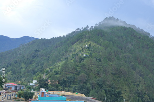 A panoramic view of the mountains of Tehri Garhwal, showing forests, mountains and beautiful villages.