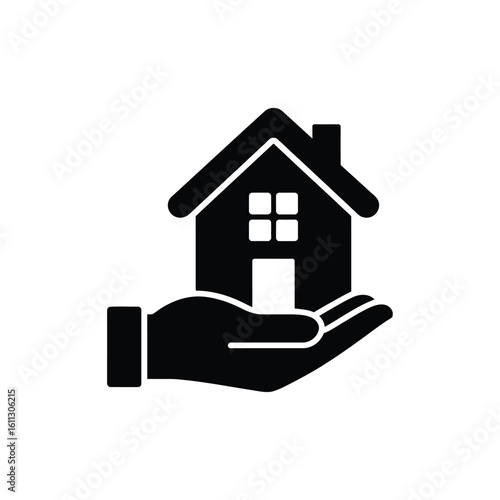 Hand holding a house icon symbolizing home ownership and real estate