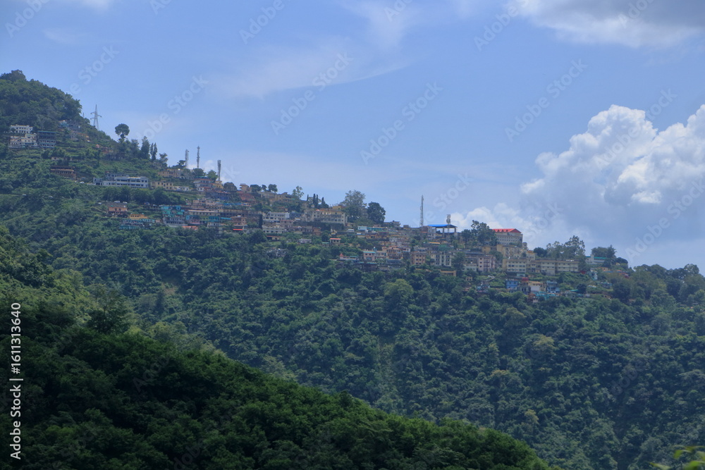 Fototapeta premium Narendra Nagar, located in Tehri Garhwal district of Uttarakhand, is a peaceful hill town known for its scenic beauty, royal history, and panoramic views of the Himalayas and the Ganga valley. 