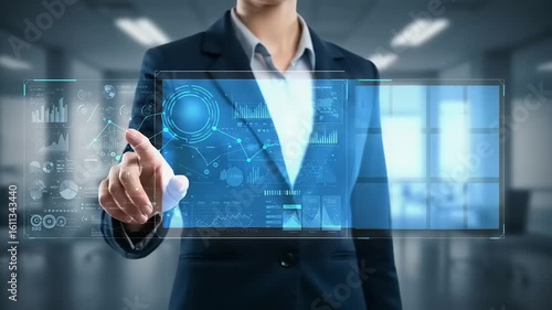 Businesswoman using futuristic touch screen interface in corporate office