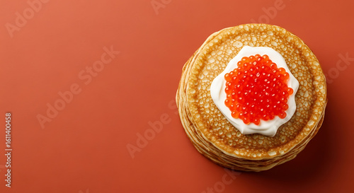 Elegant Pastry Tart with Cream and Red Caviar Topping on Stack of Pancakes