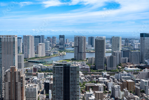 Photos tokyo bay skyline with blue sky and many condominiums